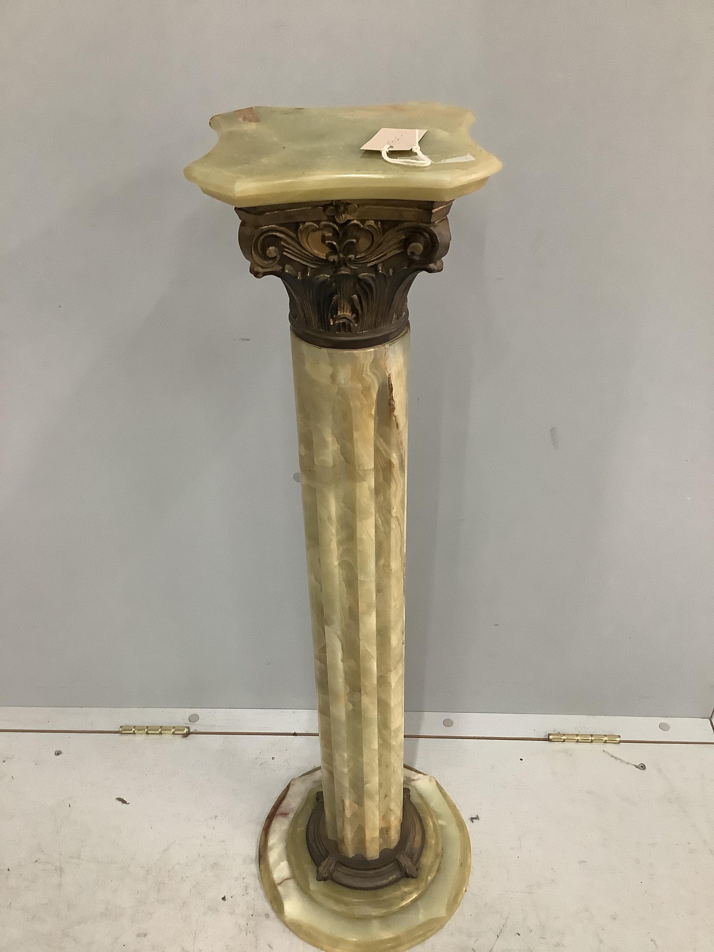 An Edwardian gilt metal mounted green onyx Corinthian column, height 95cm
